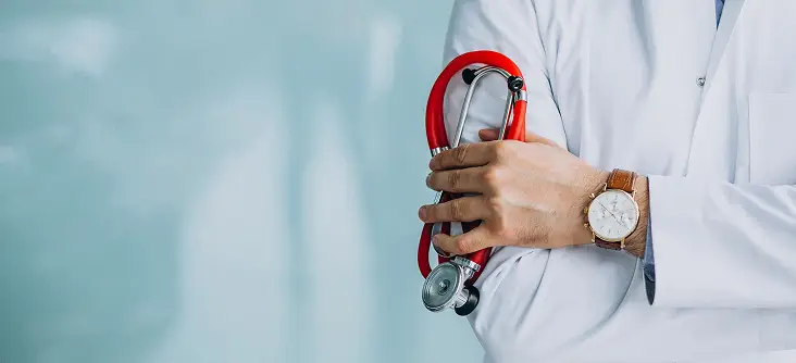closeup on a medical doctor holding a stethoscope